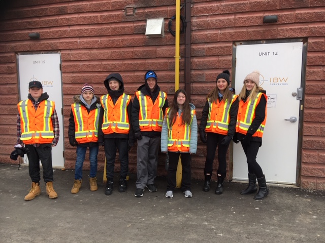 Grade 9 students at IBW Surveyors dressed for field work.